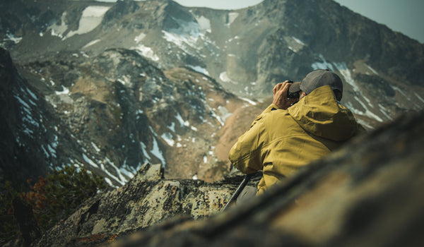 hunter glassing in mountains