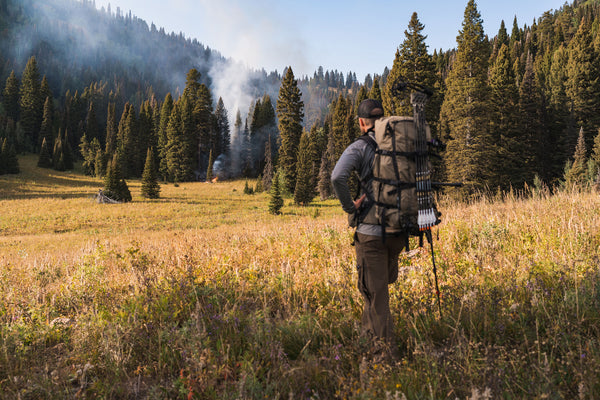 hunter observing wildfire