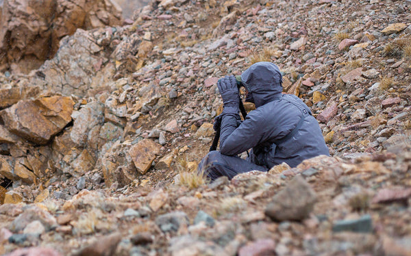 Stone Glacier Founder Kurt Racicot glassing on a bighorn sheep hunt